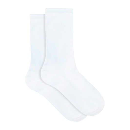 Underworks women's white cotton-rich, crew length socks shown out of packaging.